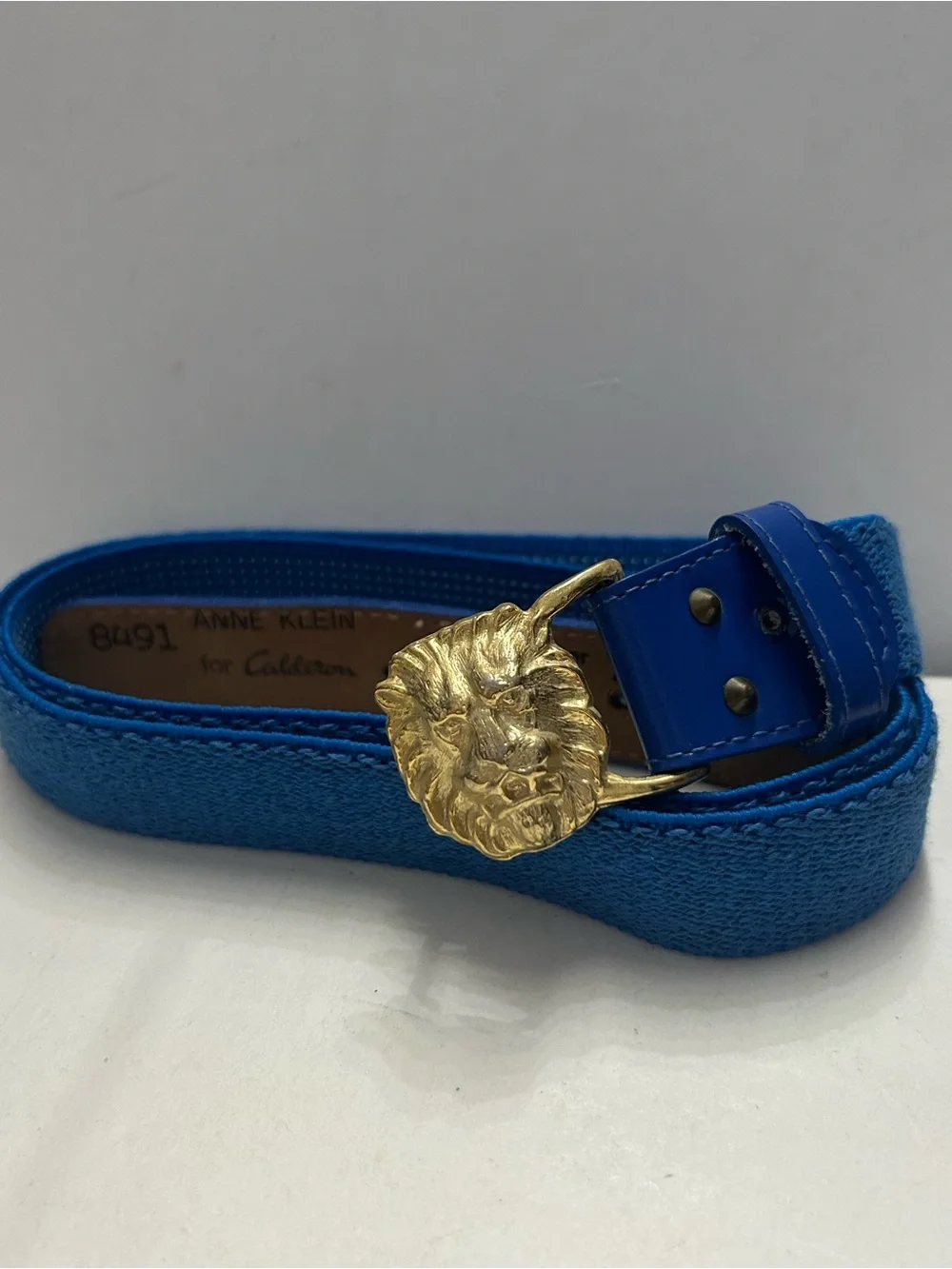 Vintage ANNE KLEIN for Calderon Blue Stretch Leather Belt Gold Lion Buckle 8491